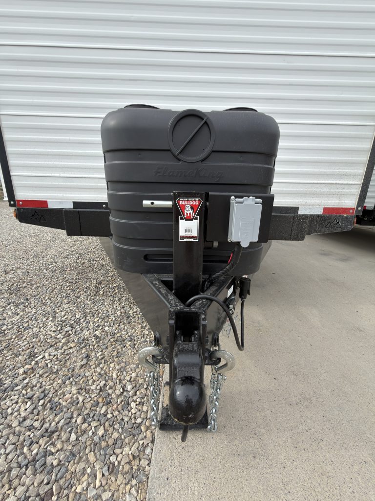 Front view of the Schrauth Camp propane tanks and tongue jack