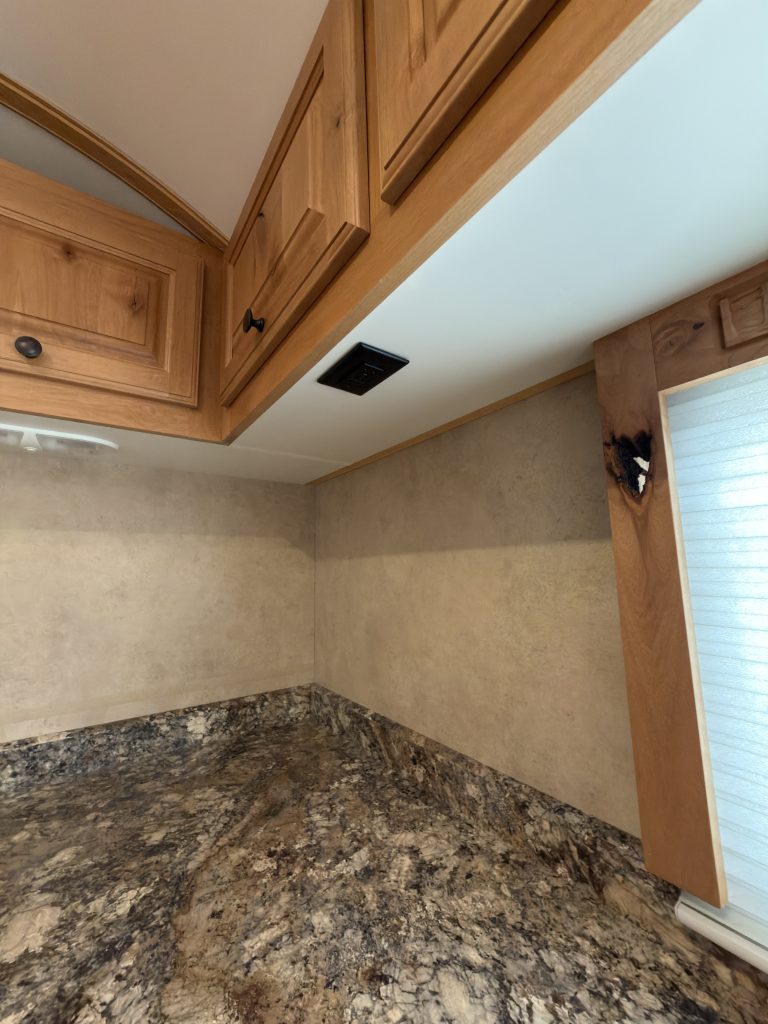 Detail view of Kitchen Counter & Overhead Cabinets in the Schrauth Camp.