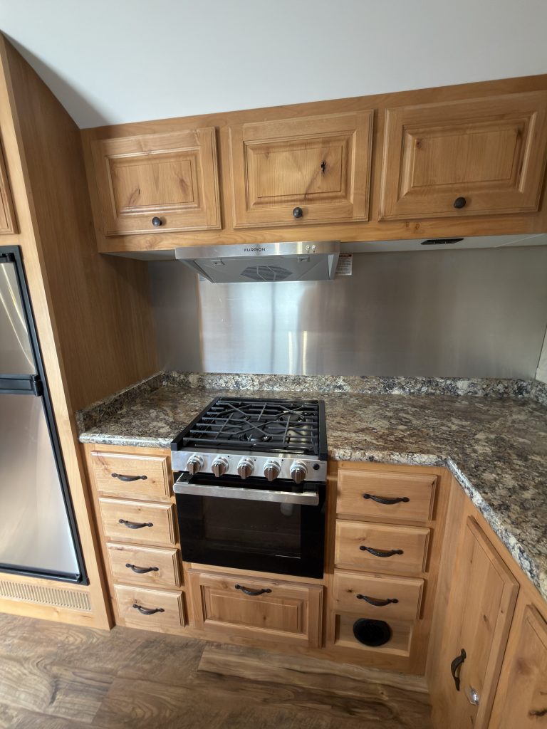 Detail view of Three-Burner Range & Cabinetry in the Schrauth Camp.