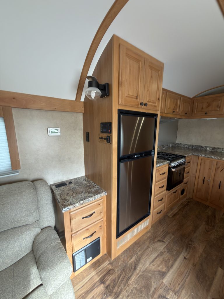 Detail view of Raised Propane/Electric Refrigerator in the Schrauth Camp.