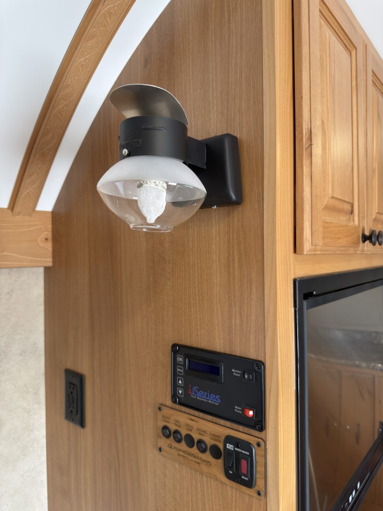 Wall-mounted propane light in the Schrauth Camp