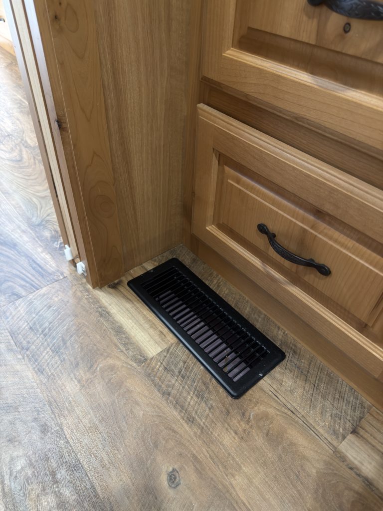 Detail view of Bedroom Floor Vent in the Schrauth Camp.