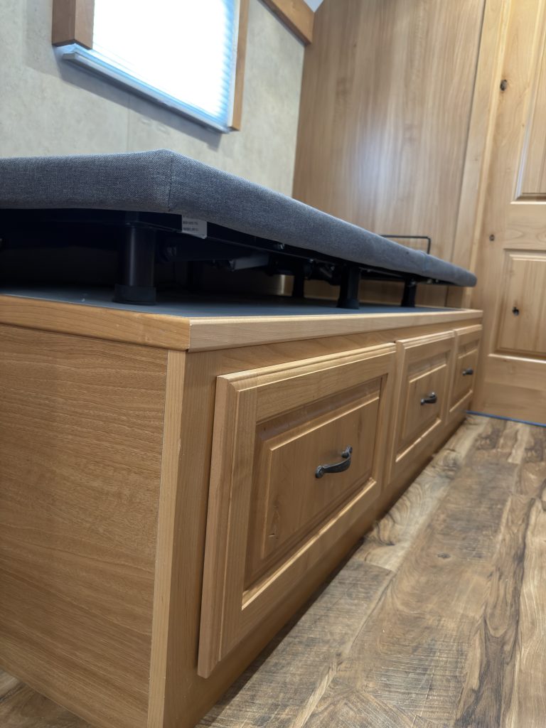 Detail view of Under-Bed Storage Access in the Schrauth Camp.