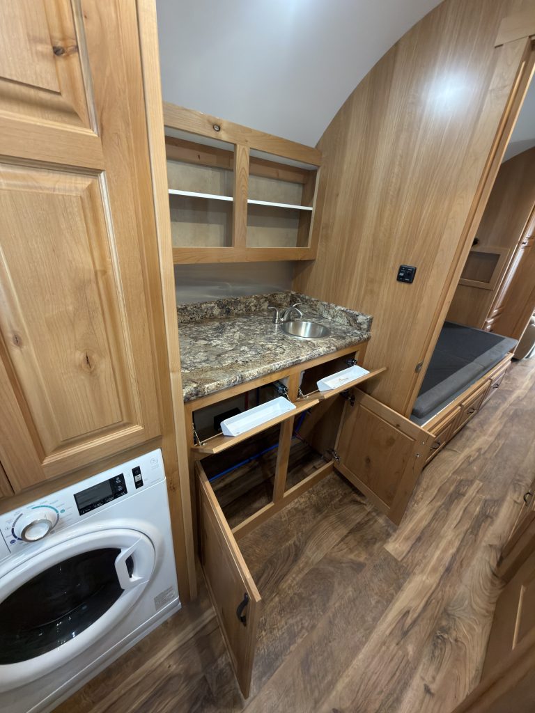 Detail view of Laundry Area & Vanity Storage in the Schrauth Camp.