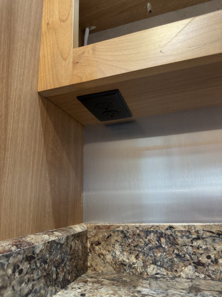 Detail view of Bathroom Cabinet Outlet in the Schrauth Camp.