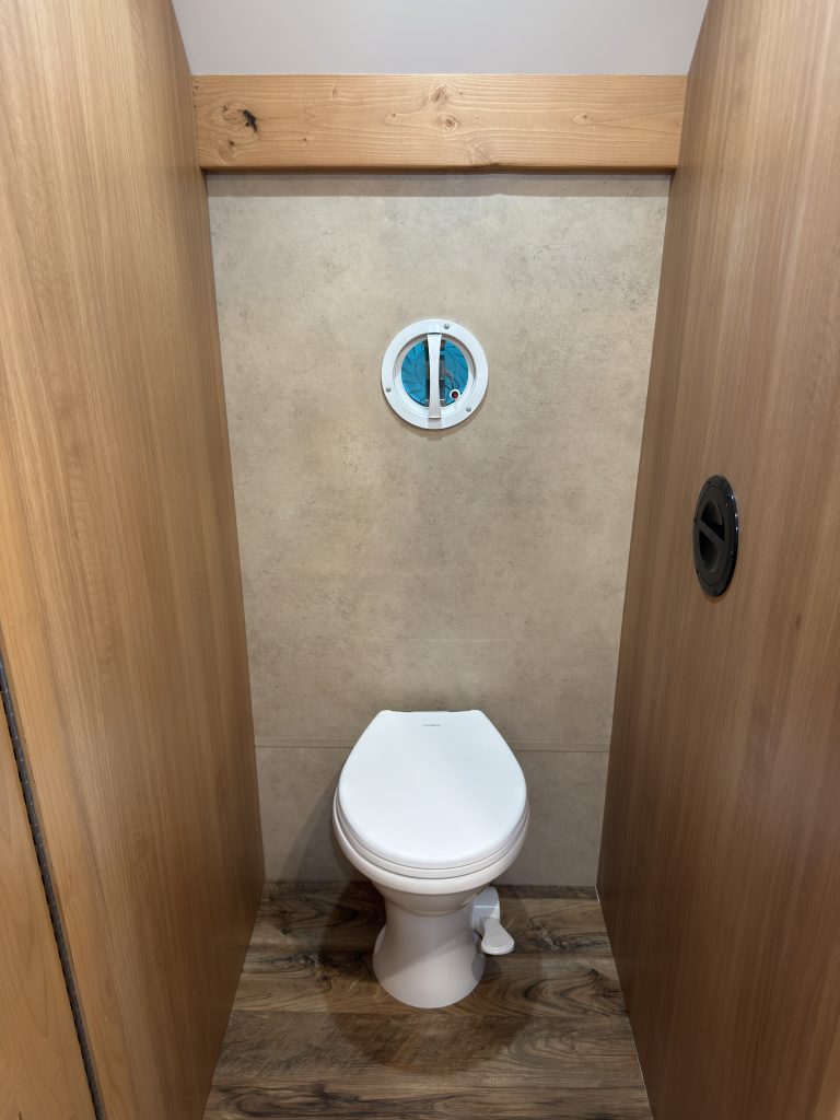 Porcelain toilet with bidet attachment