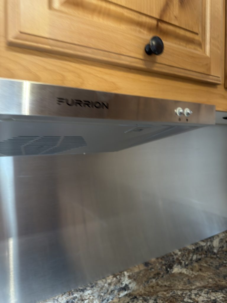 Exterior-vented range hood in the Schrauth Camp kitchen