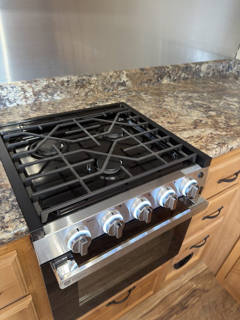 Detail view of Direct-Spark Cooktop Controls in the Schrauth Camp.