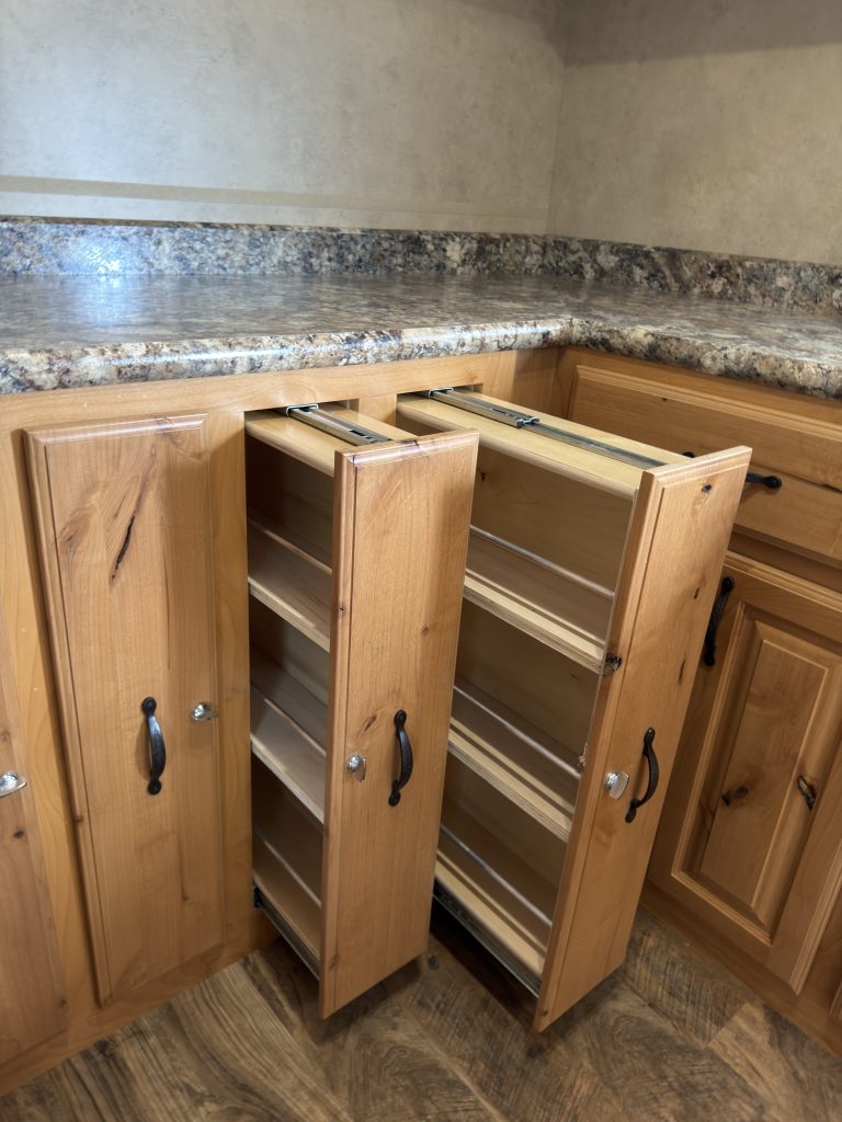 Slide-out pantry storage in the Schrauth Camp kitchen