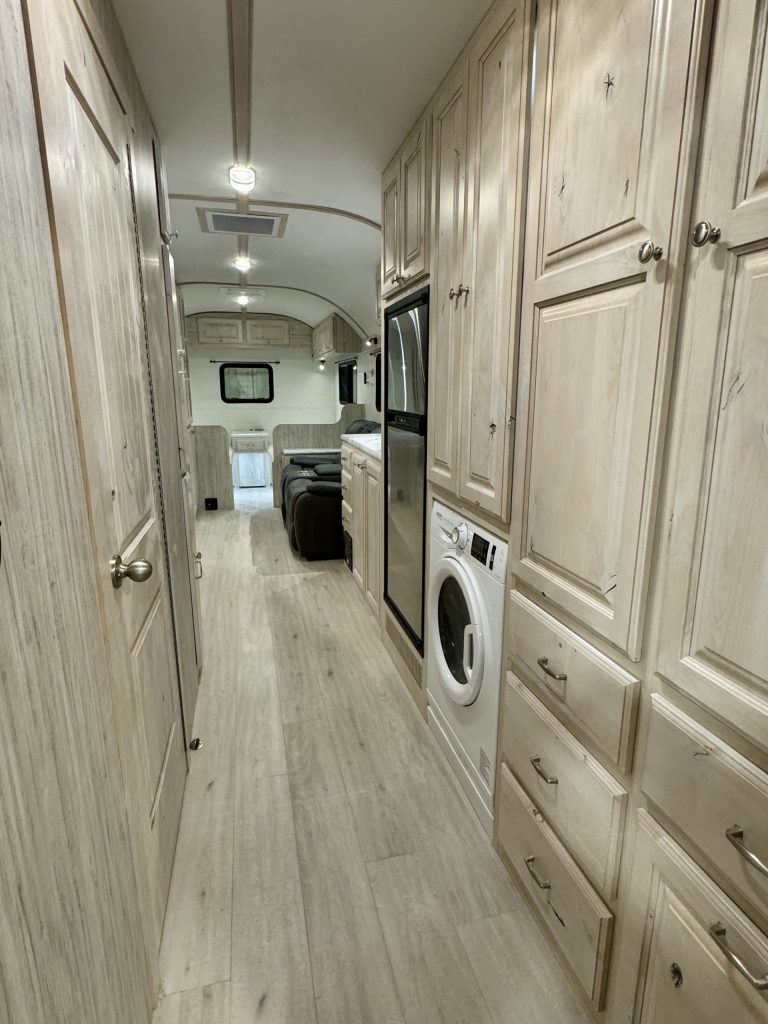 Peak Camp Hallway With Laundry and Storage