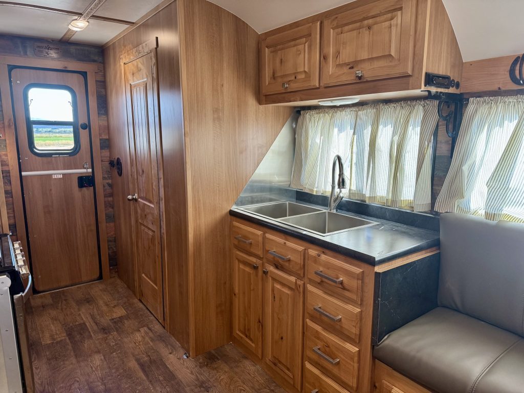 Peak Camp Kitchen With Double Sink and Entry