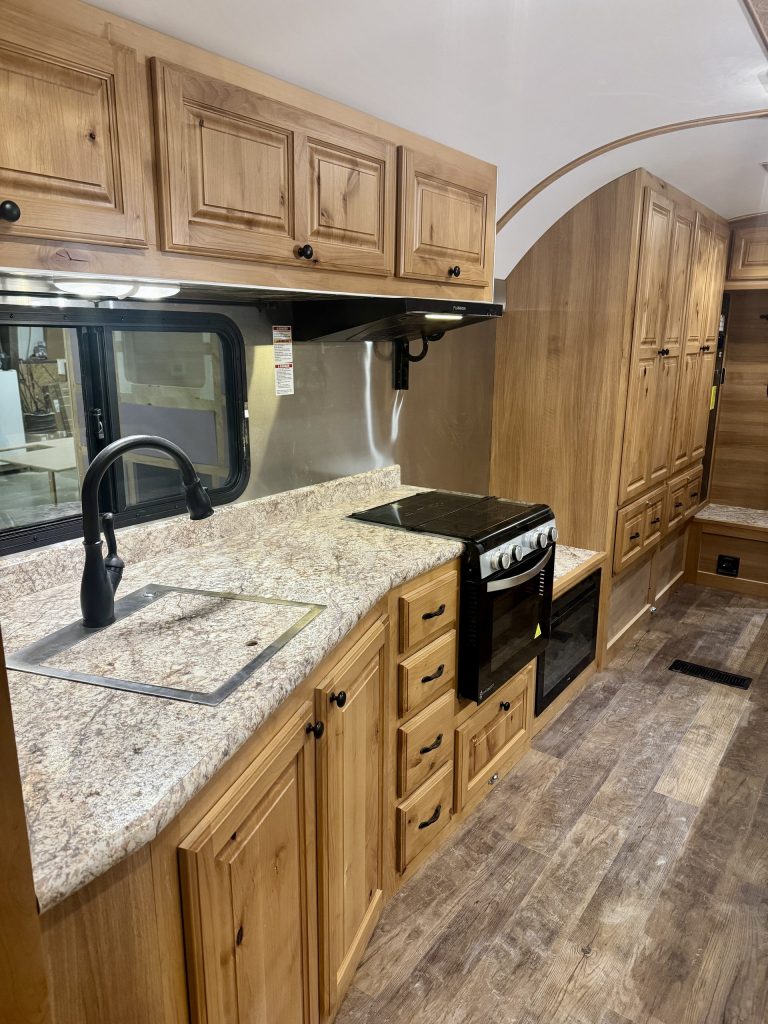 Peak Camp Kitchen With Granite Counters