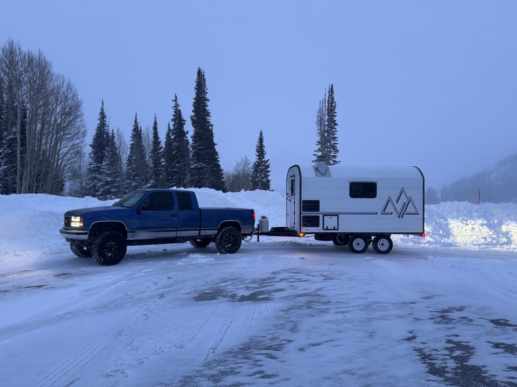 Peak Camp Traveling Through Deep Snow