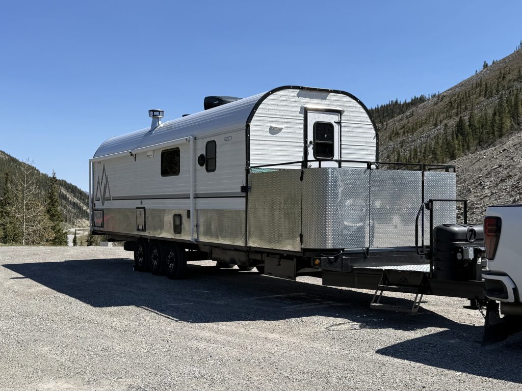 Porch-Equipped Peak Camp in the Mountains