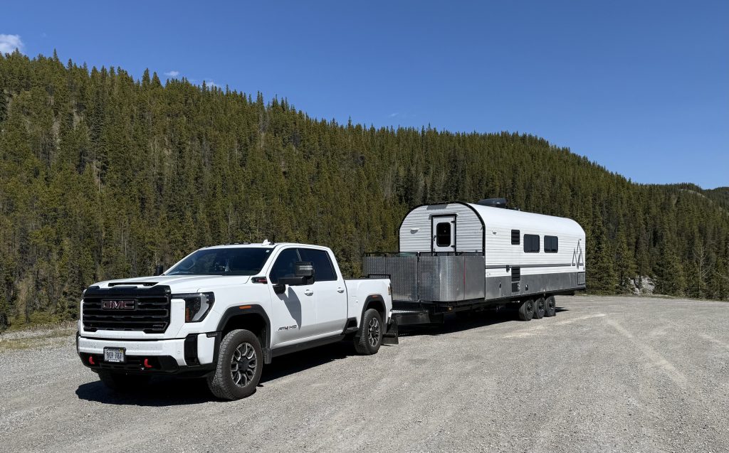 Truck and Peak Camp at a Mountain Turnout