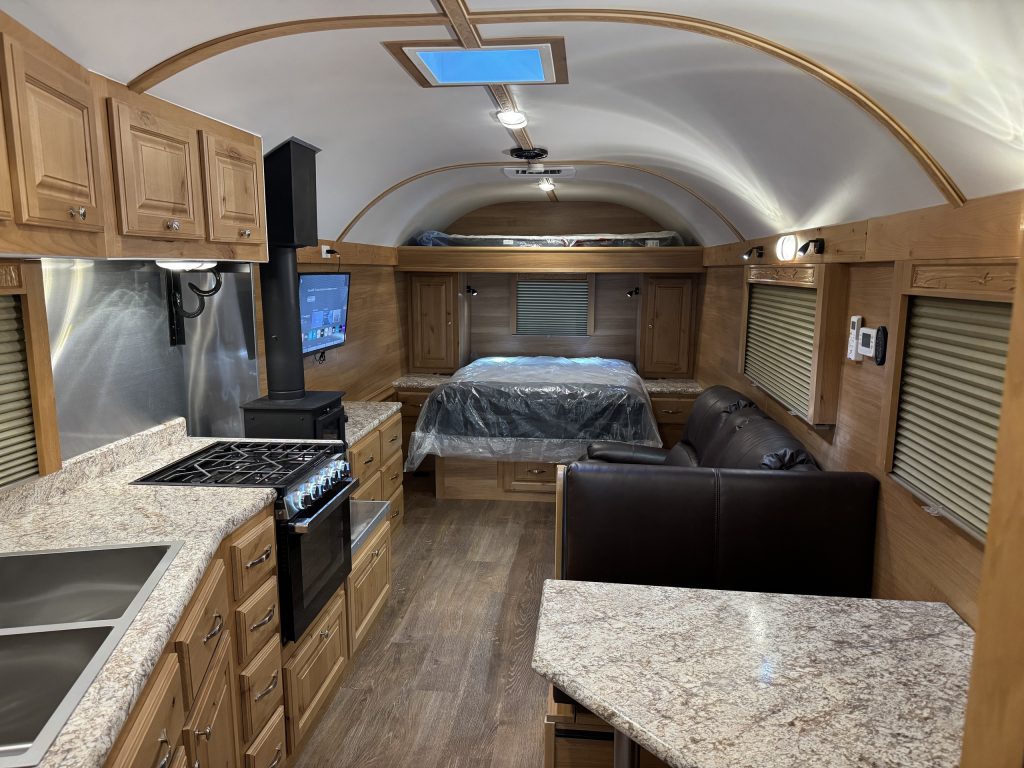 Warm-Wood Peak Camp Interior With Bedroom