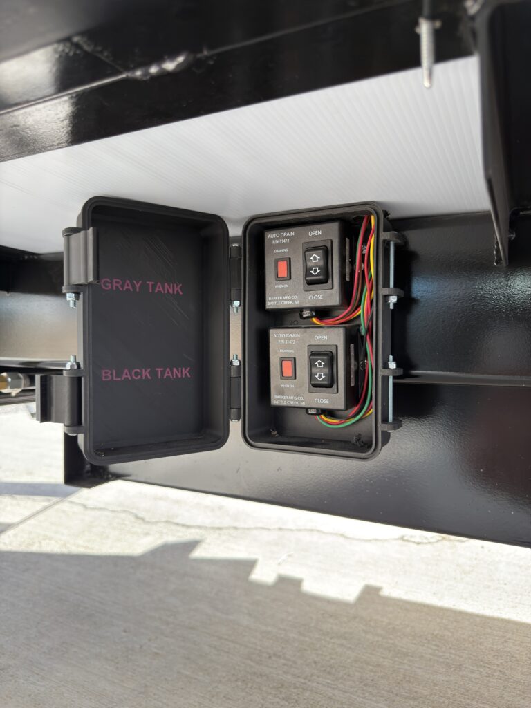 Image of the black and gray tank control panel of Gail Camp #131.