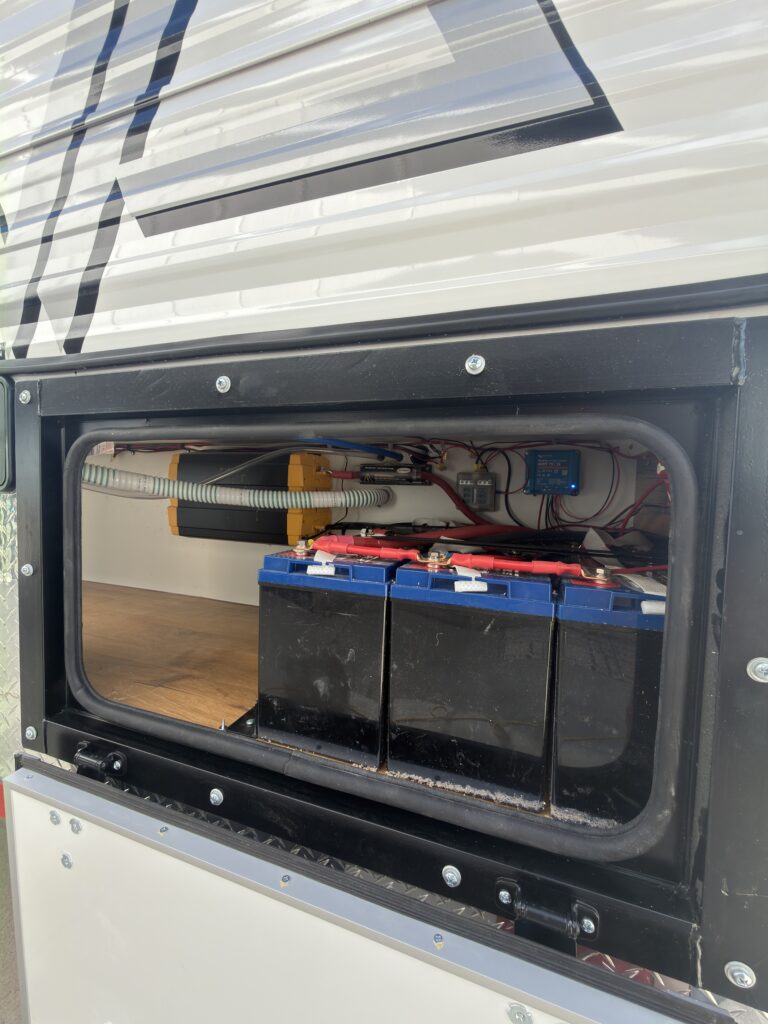 Image of the exterior battery compartment of Gail Camp #131.