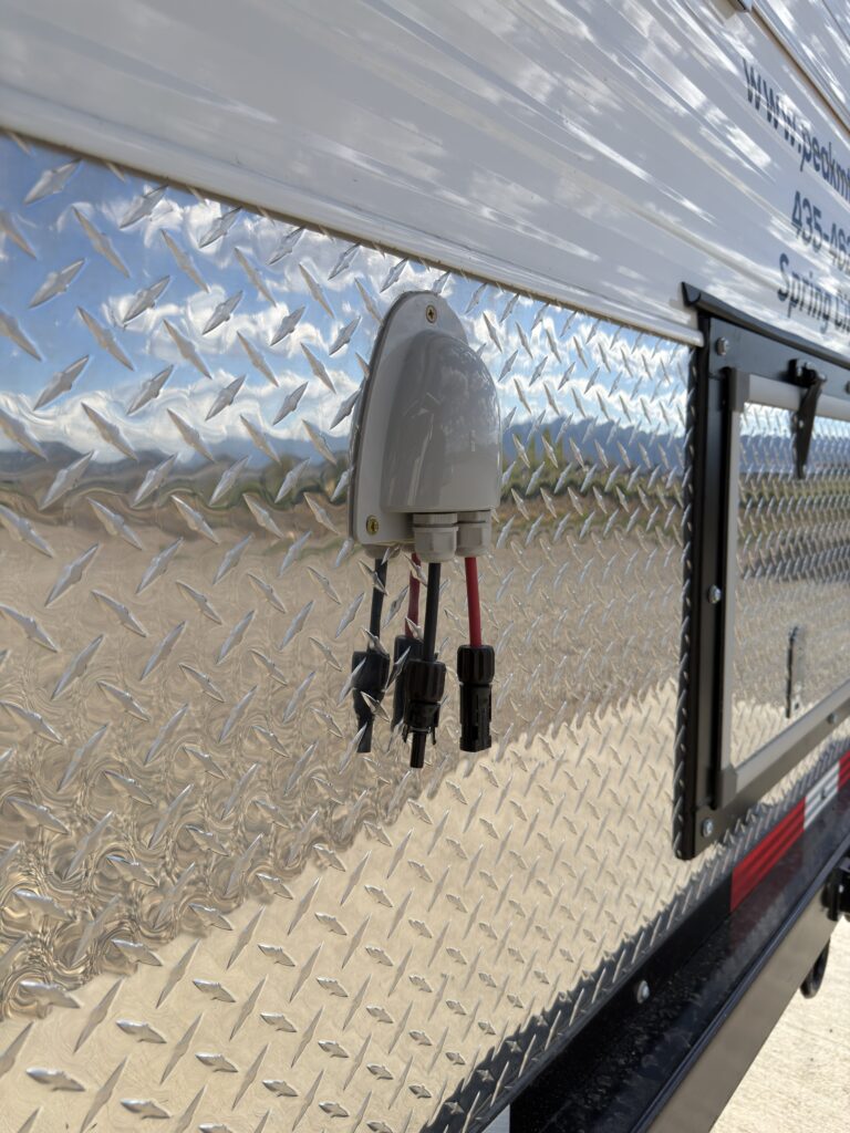 Image of the exterior solar panel connections of Gail Camp #131.