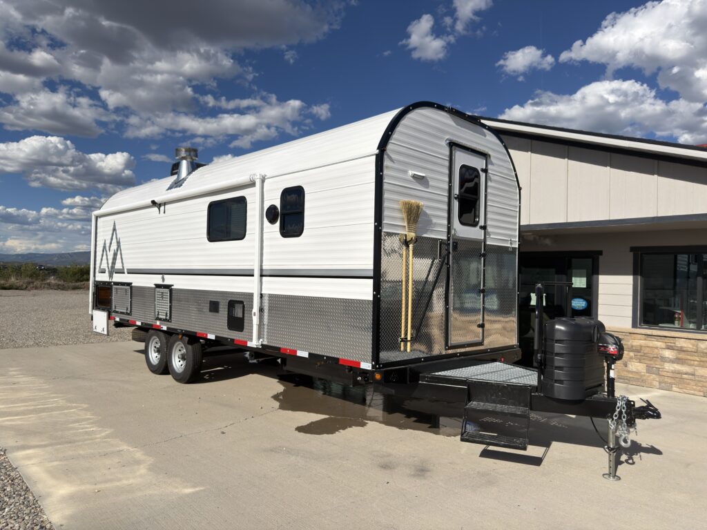 Image of the front curb-side exterior and entry of Gail Camp #131.