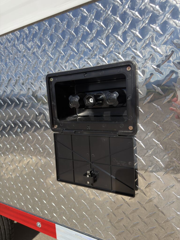 Image of the exterior spray port shower of Gail Camp #131.
