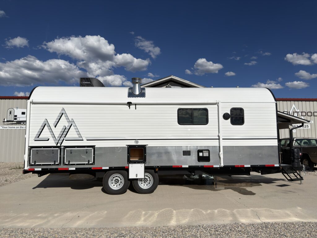 View of the full passenger-side exterior of Gail Camp #131.