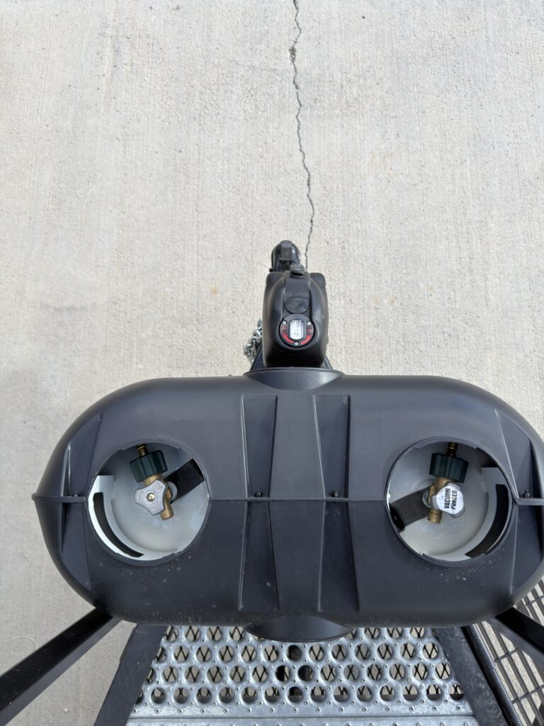 Image of the dual propane tank compartment of Gail Camp #131.