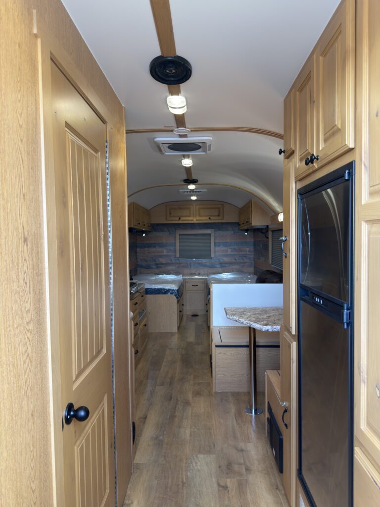Image of the interior hallway toward the bedroom of Gail Camp #131.