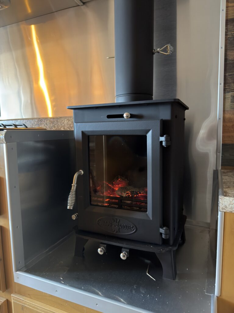 Image of the wood-burning stove of Gail Camp #131.