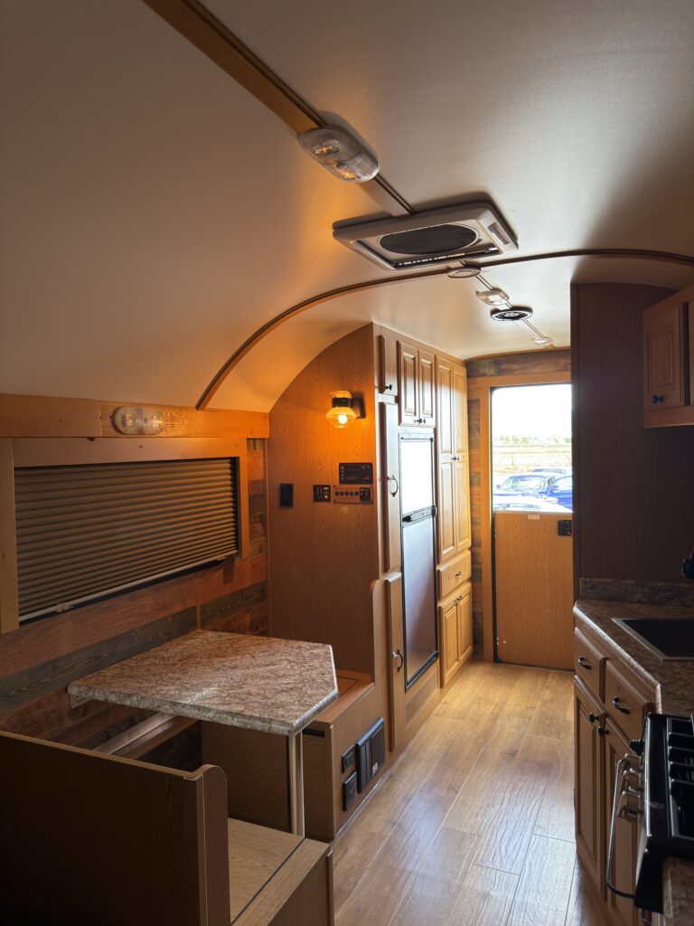 Image of the main cabin with dinette seating of Gail Camp #131.