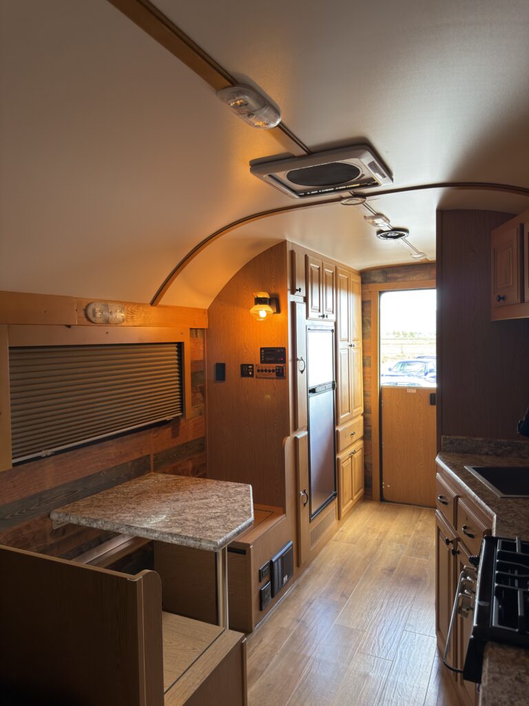Alternate view of the main cabin with dinette seating of Gail Camp #131.