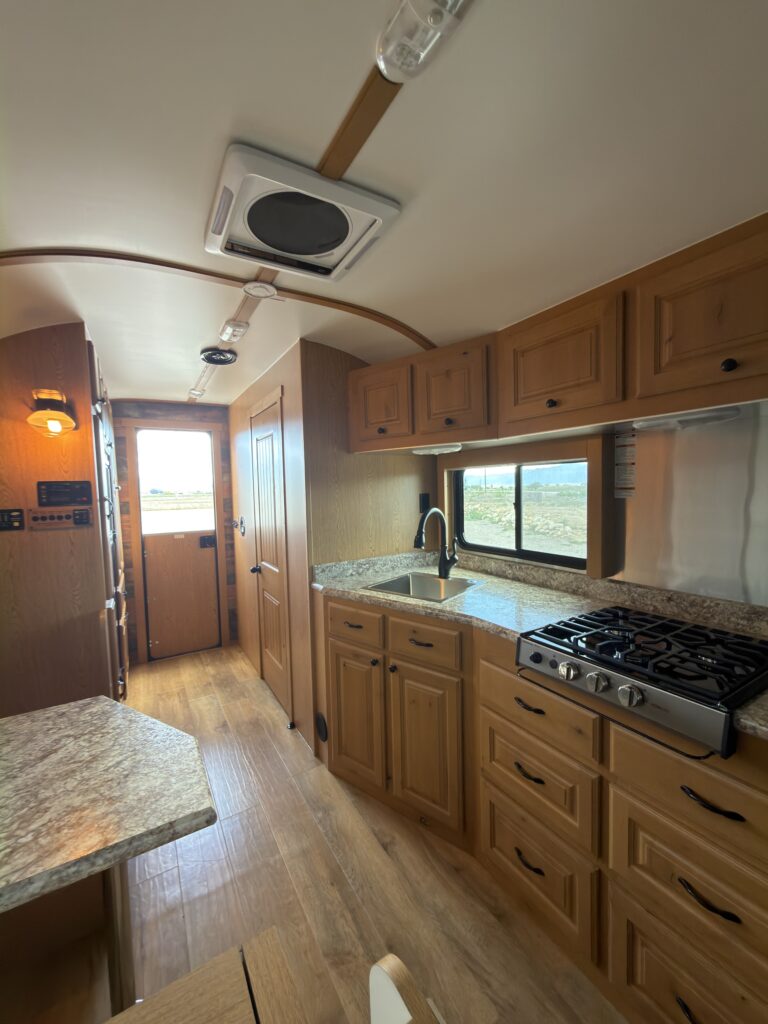 View of the kitchen toward the entry of Gail Camp #131.