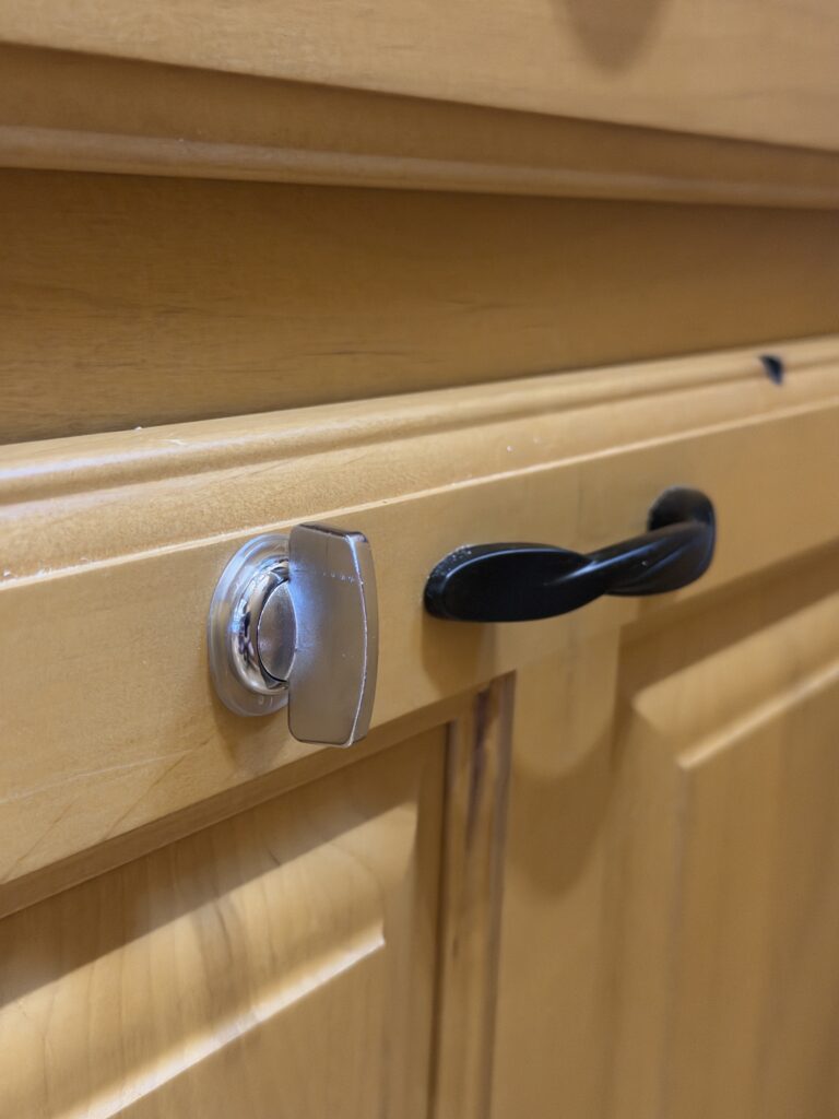 Alternate view of the cabinet latch of Gail Camp #131.