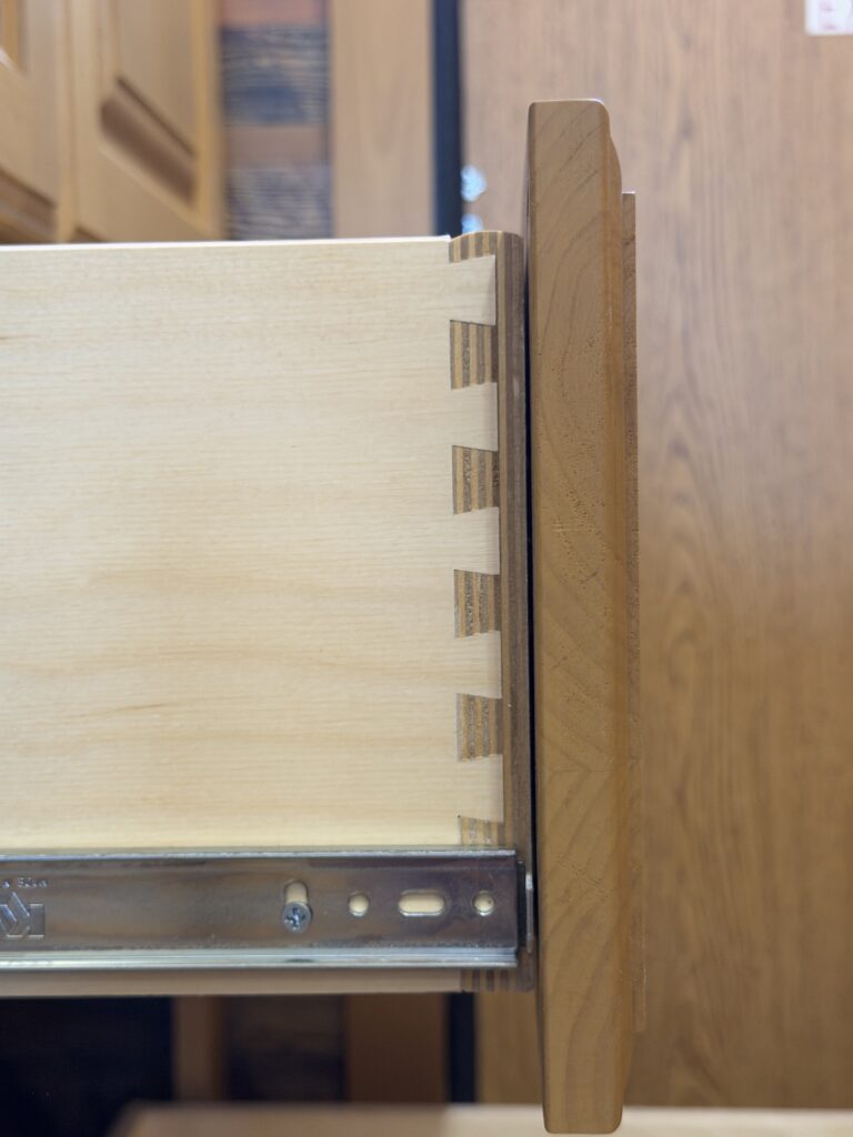 Image of the dovetail drawer construction of Gail Camp #131.