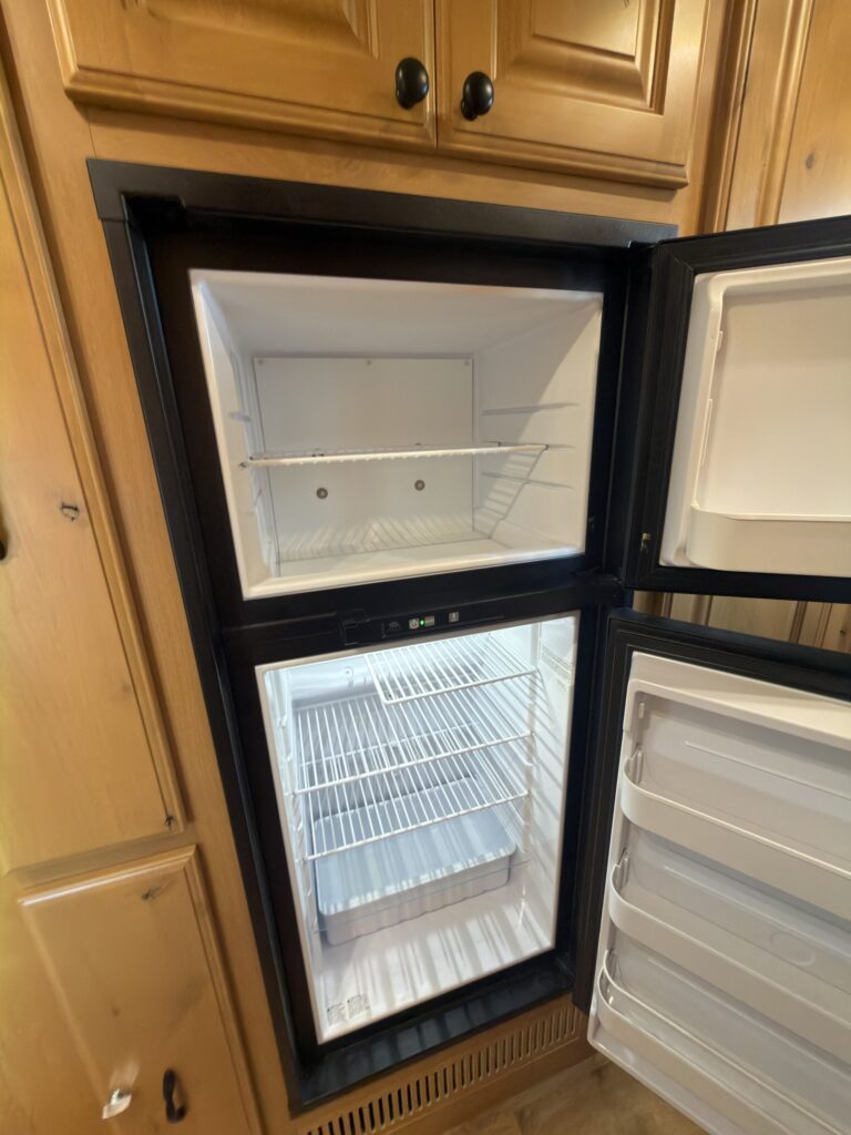 Image of the refrigerator and freezer interior close-up of Gail Camp #131.