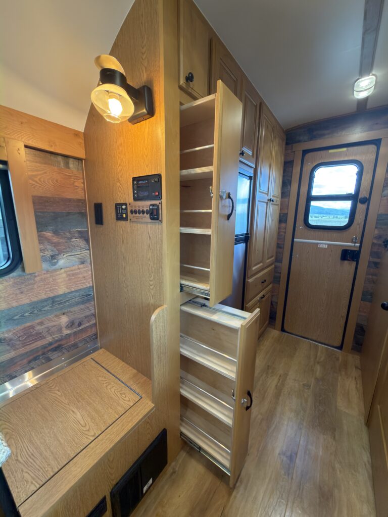 Image of the slide-out pantries of Gail Camp #131.