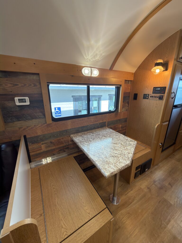 Image of the dinette seating area of Gail Camp #131.