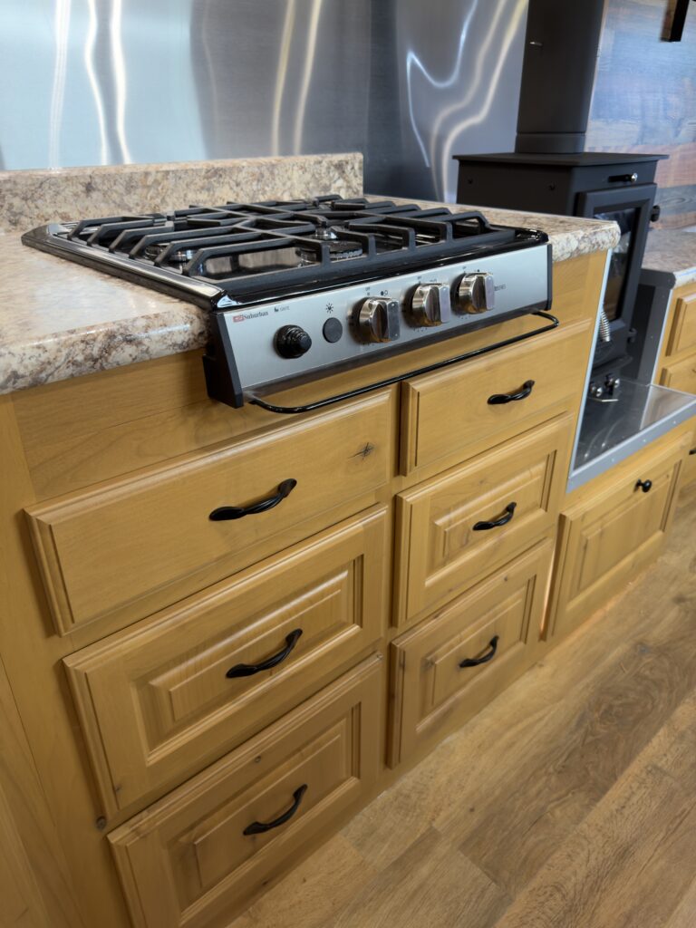 Image of the cooktop and kitchen drawers of Gail Camp #131.