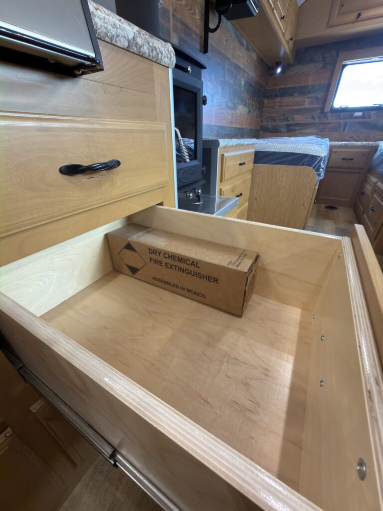 Image of the large kitchen drawer interior of Gail Camp #131.