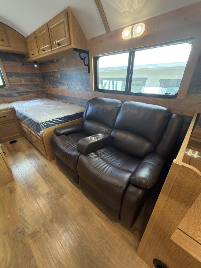 Image of the reclining sofa in main cabin of Gail Camp #131.