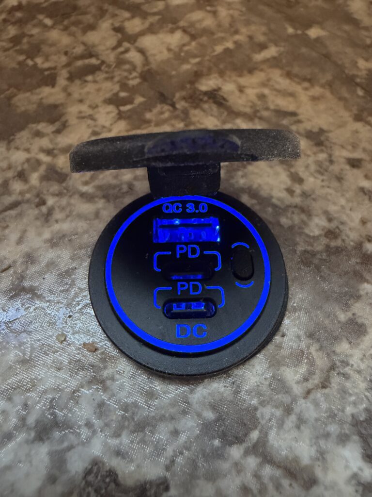 Image of the uSB charging port close-up of Gail Camp #131.