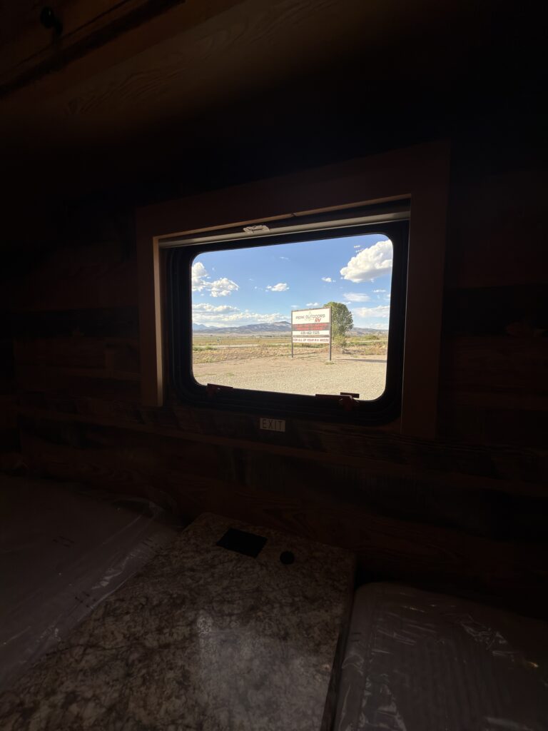Image of the bedroom window in low light of Gail Camp #131.