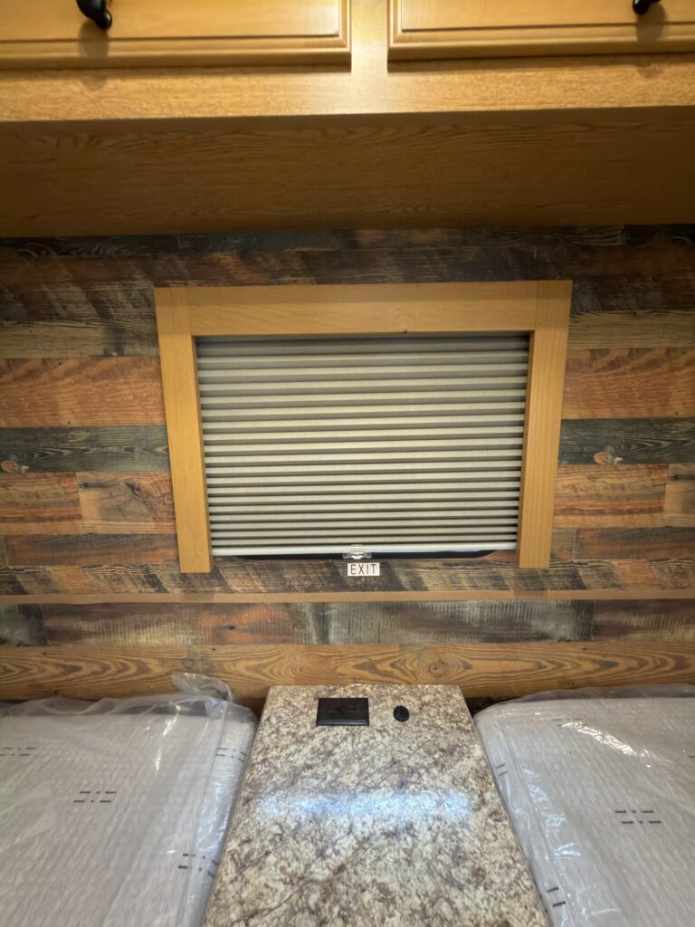 Image of the bedroom window shade of Gail Camp #131.