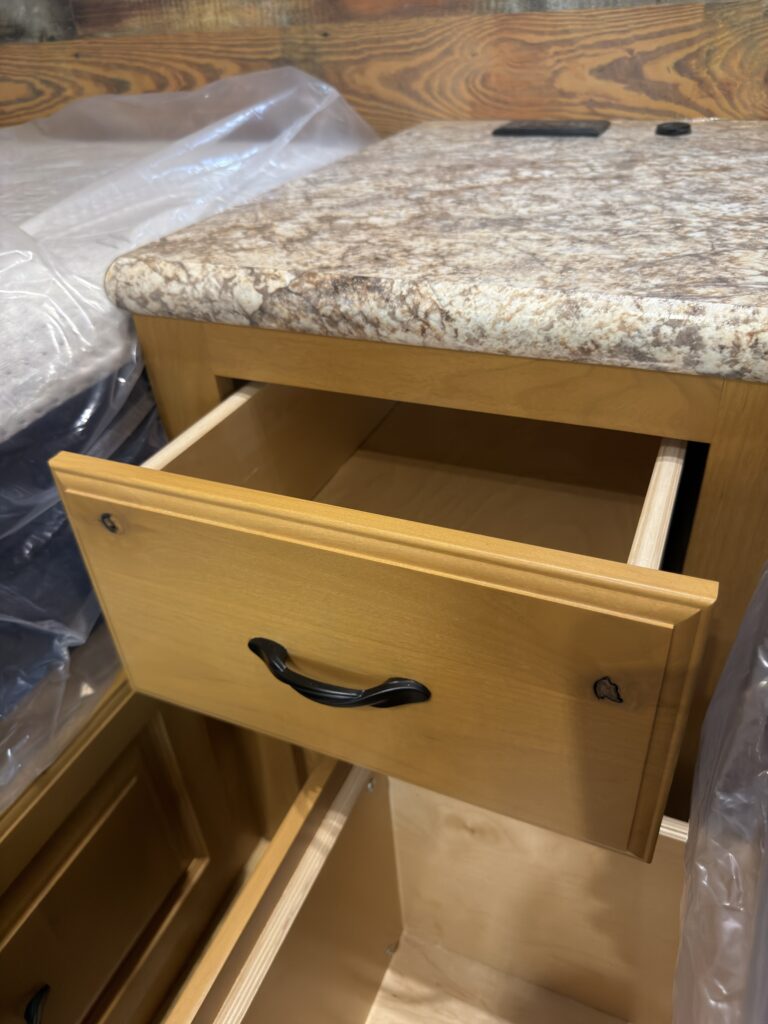 Image of the bedroom nightstand drawer of Gail Camp #131.