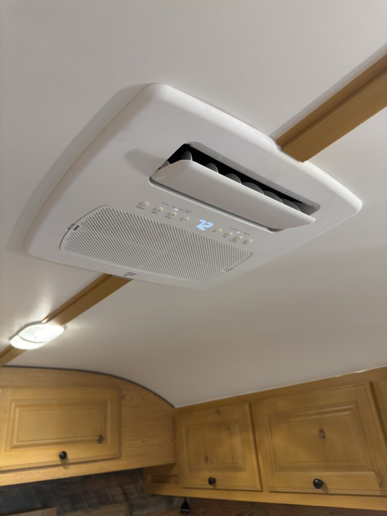 Alternate view of the ceiling air conditioner of Gail Camp #131.