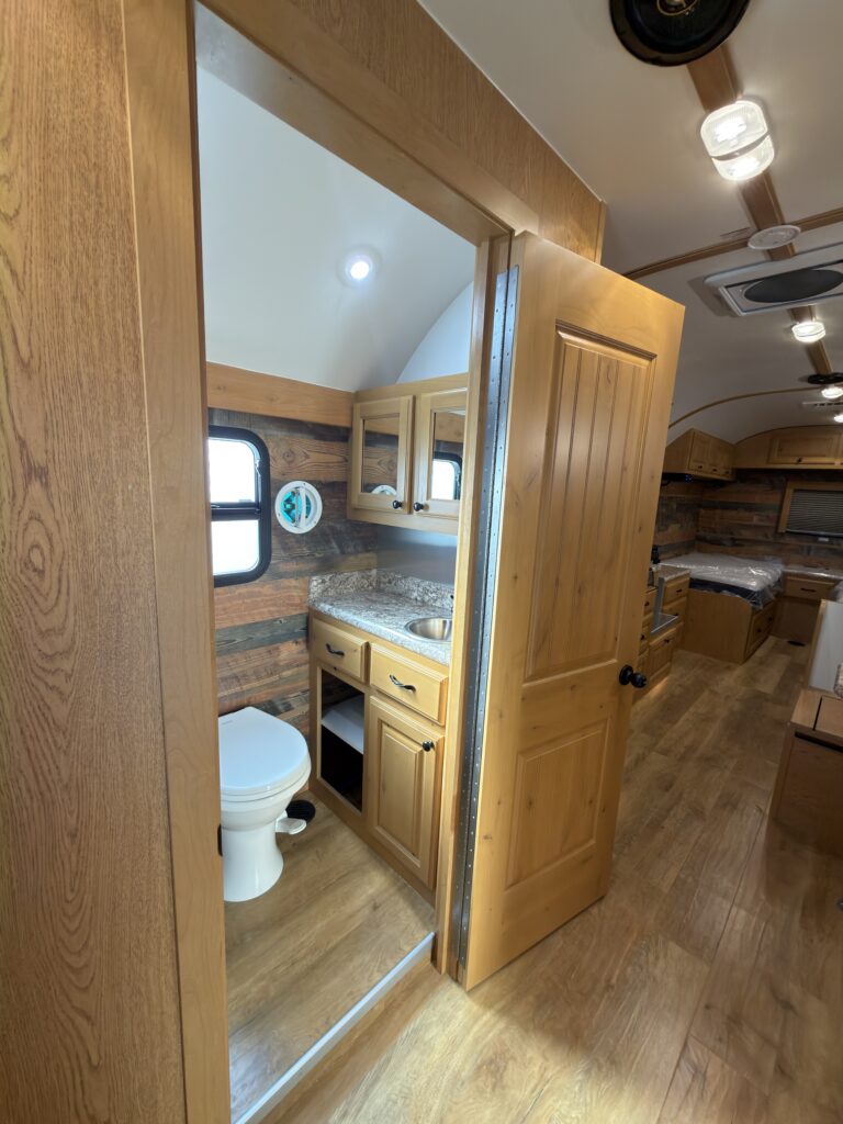 Image of the hallway and bathroom entrance of Gail Camp #131.