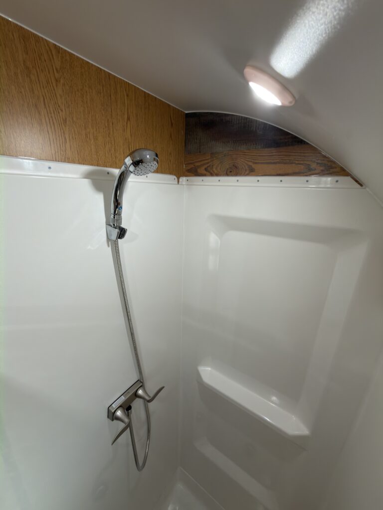 Image of the bathroom shower stall of Gail Camp #131.