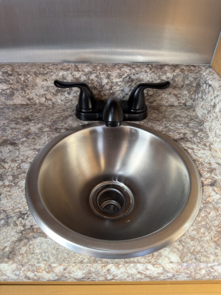 Image of the bathroom sink of Gail Camp #131.