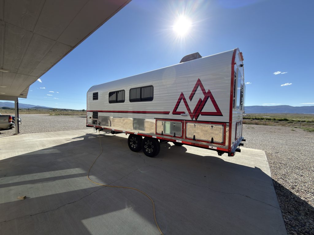 Road-Side Rear Three-Quarter Exterior in Nielsen Camp #133