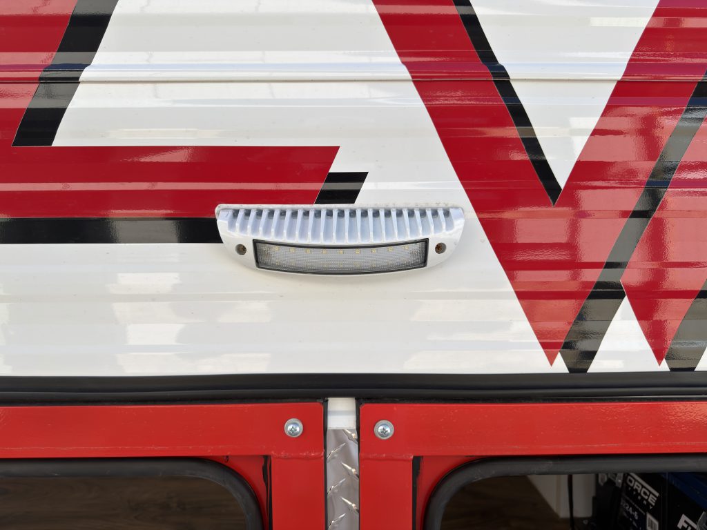 Road-side exterior compartment light on Nielsen Camp #133